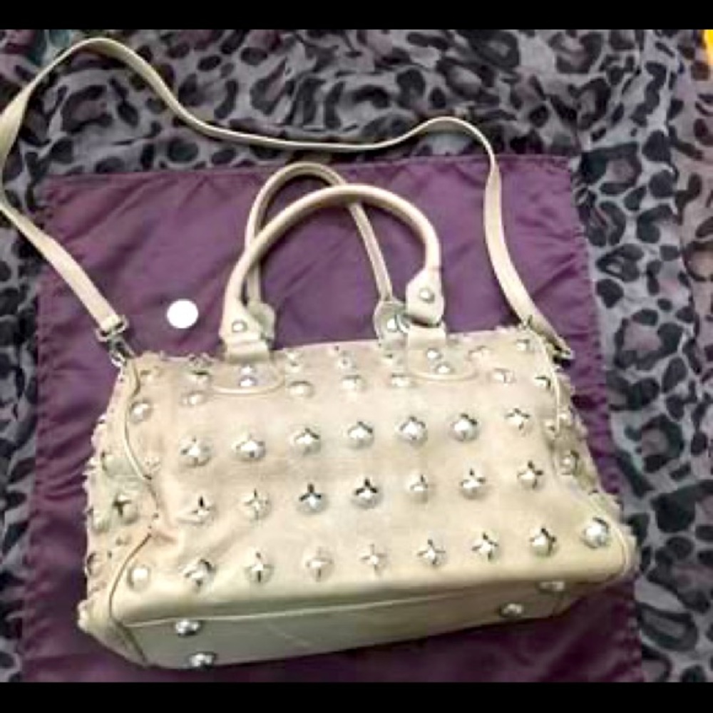 Italian; hand crafted leather and steel hardware handbag.